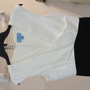 CeCe cream and black jumpsuit. Used item. Great condition. Size 4